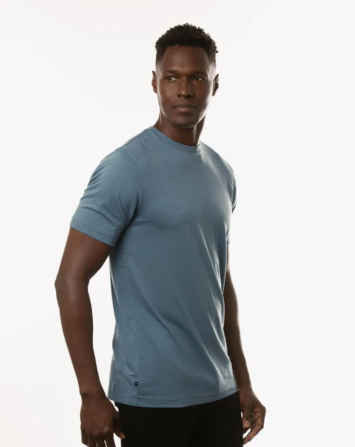 Men Tees TravisMathew OLYMPUS TEE Heather Copen Blue Men Tees TravisMathew OLYMPUS TEE Heather Copen Blue