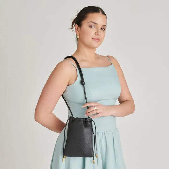 Handbags Shop Dolce Vita Evie Crossbody Pouch Black Pebble Leather Leather Crossbody Pouch Black Pebble Leather