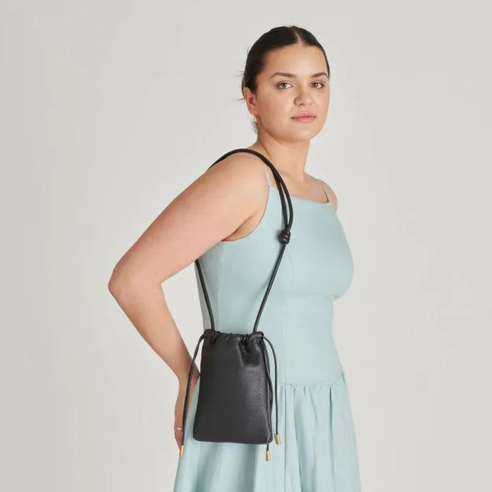 Handbags Shop Dolce Vita Evie Crossbody Pouch Black Pebble Leather Leather Crossbody Pouch Black Pebble Leather