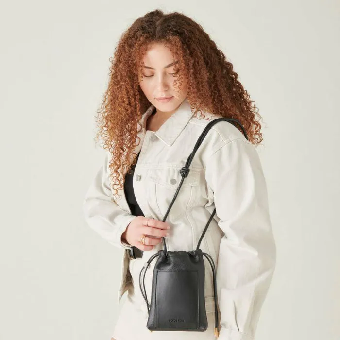 Handbags Shop Dolce Vita Evie Crossbody Pouch Black Pebble Leather Leather Crossbody Pouch Black Pebble Leather
