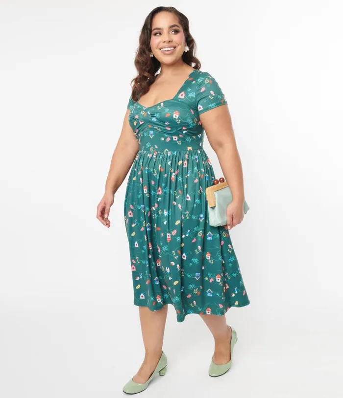 Plus Size 1950s Green Birdhouse Twist Front Swing Dress DressesPlus Unique Vintage Pocket Dresses
