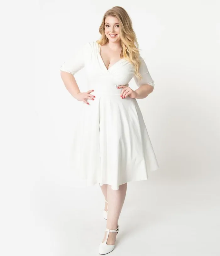 Plus Size 1950s Ivory Delores Swing Dress With Sleeves DressesPlus Unique Vintage Pocket Dresses