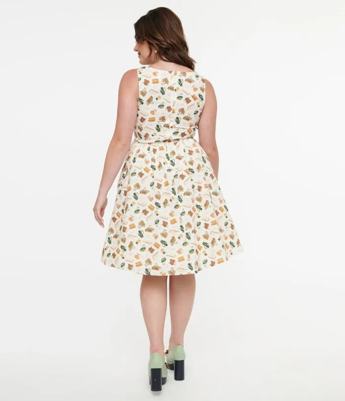 Retrolicious 1950s Cream Book and Tea Print Cotton Swing Dress Dresses Unique Vintage Pocket Dresses