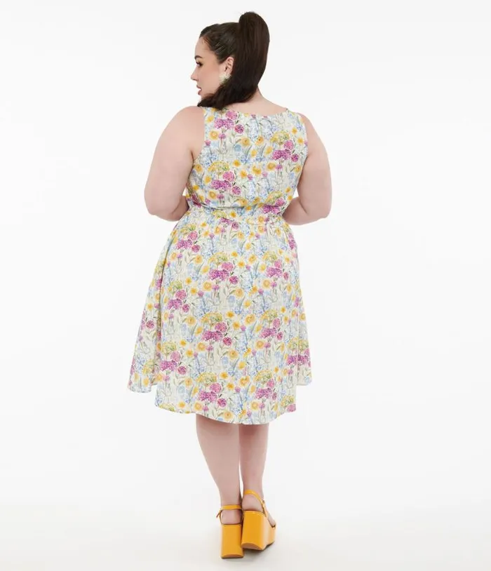 Retrolicious Plus Size 1950s Vintage Style Wildflower Cotton Swing Dress DressesPlus Unique Vintage Pocket Dresses